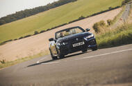 BMW M440i Cabriolet in blue   cornering front