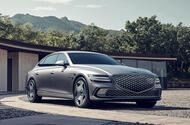 "Enhanced Genesis G80 EV: Increased Range, Spacious Interior, and Chauffeur Mode | Giga Gears"