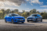 Blue Vauxhall Astra and grey Vauxhall Corsa